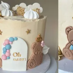 Söt gender reveal tårta med nallebjörnar, moln och stjärnor. Perfekt för ett "gender reveal tårta recept" firande!